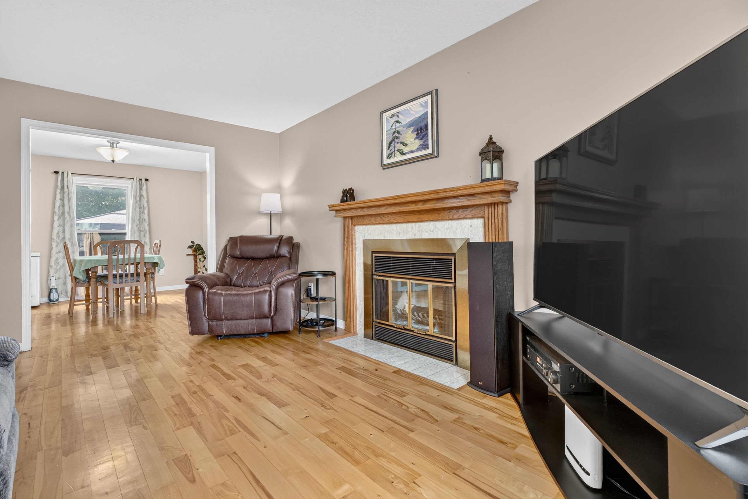 Living room with wood-burning fireplace
