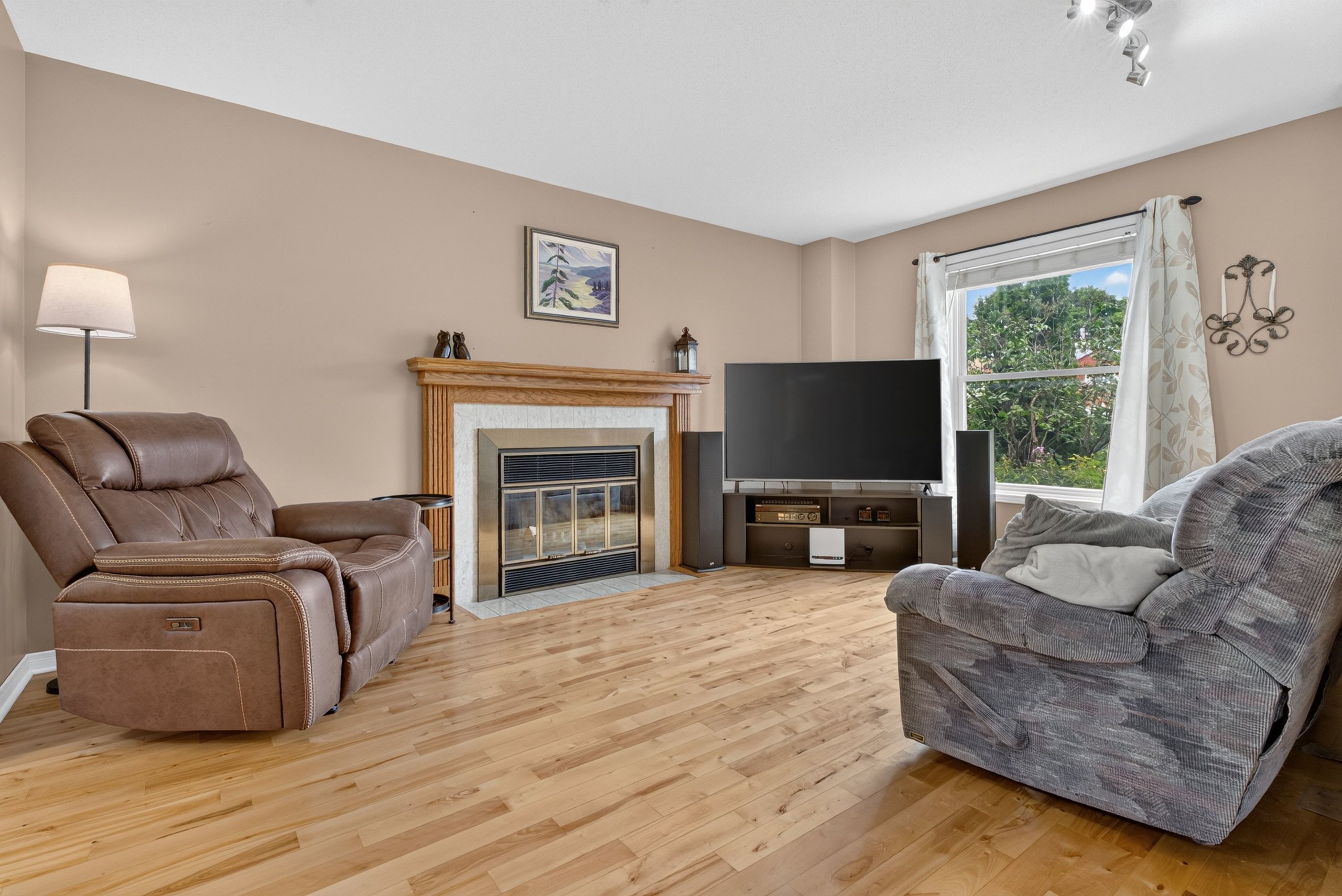 Living room with wood-burning fireplace